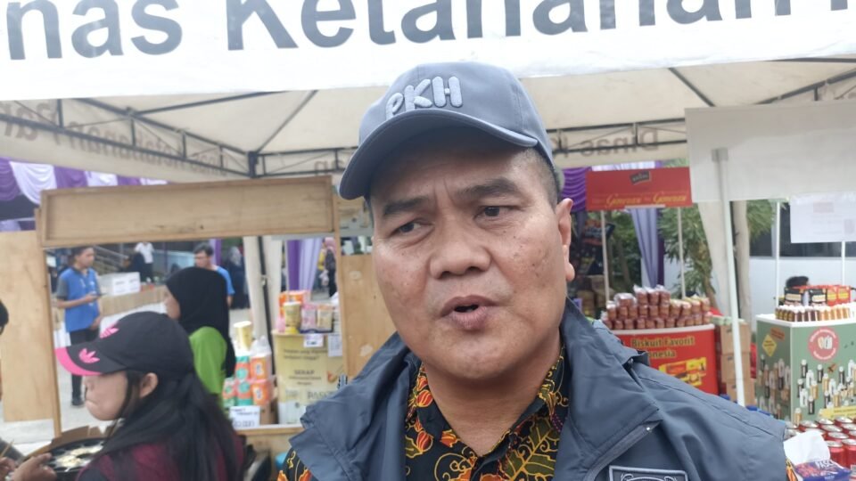 Kepala Dinas Ketahanan Pangan dan Pertanian, H. M. Burham