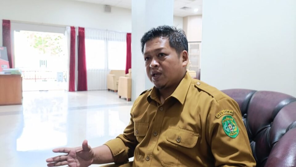 Teks: Kepala Dinas Pemuda dan Olahraga (Kadispora) Kukar, Aji Ali Husni.
